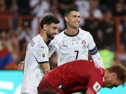 كريستيانو رونالدو وبرونو فرنانديز يحتفلان بهدف سجلته البرتغال في مرمى أرمينيا بتصفيات كأس العالم 2026 - 6 سبتمبر 2025 - Photolure via REUTERS