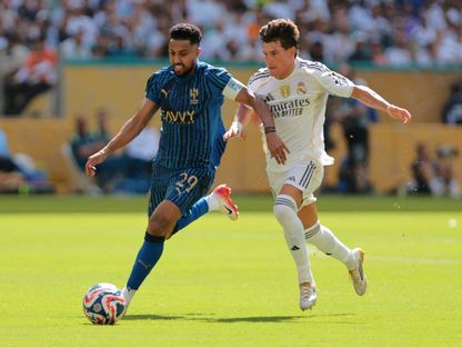 سالم الدوسري في صراع على الكرة مع فران غارسيا من مباراة الهلال وريال مدريد بكأس العالم للأندية - 18 يونيو 2025 - Reuters