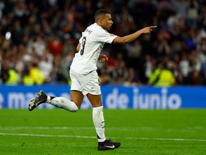 كيليان مبابي مهاجم ريال مدريد يحتفل بهدفه في مرمى مايوركا في الدوري الإسباني - 14 مايو 2025 - Reuters