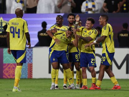 لاعبو النصر يحتفلون بعد تسجيل الهدف الرابع أمام العين في أبطال آسيا للنخبة - 5 نوفمبر 2024 - Reuters