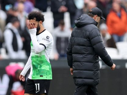 مدرب ليفربول يورغن كلوب ومحمد صلاح بعد مباراة وست هام يونايتد – 27 أبريل 2024 - Reuters