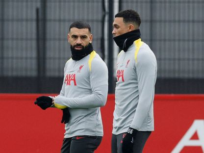 محمد صلاح وترينت ألكسندر أرنولد خلال تدريب لليفربول - 20 يناير 2025 - Reuters