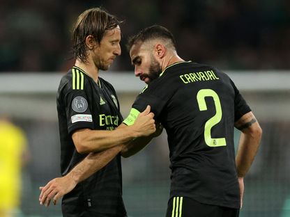 لوكا مودريتش وداني كارفاخال خلال مباراة سلتيك وريال مدريد بدوري أبطال أوروبا - 6 سبتمبر 2022 - Reuters