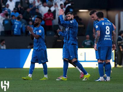 احتفال لاعبين من الهلال بالفوز على الفتح في الدوري السعودي - 14 فبراير 2026 - X/@Alhilal_FC