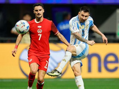 ميسي يسدد في مباراة الأرجنتين وكندا بافتتاح كوبا أميركا 2024 - Reuters