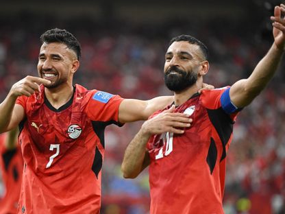 محمود تريزيغيه يحتفل بهدفه مع محمد صلاح خلال مباراة مصر ونيوزيلندا بكأس العالم - 22 يونيو 2026 - Reuters