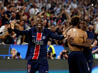 عثمان ديمبيلي مهاجم باريس سان جيرمان يحتفل بالهدف الثالث لفريقه أمام إنتر ميلان في نهائي دوري أبطال أوروبا - 31 مايو 2025 - Reuters