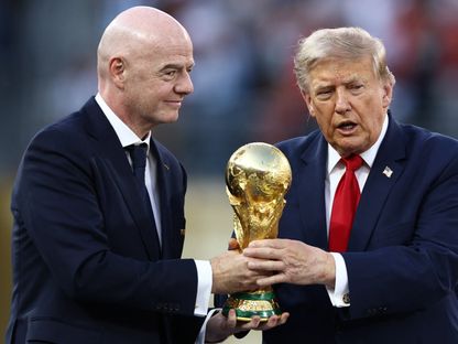 جياني إنفانتينو ودونالد ترمب بعد نهائي كأس العالم - 20 يوليو 2026 - Reuters