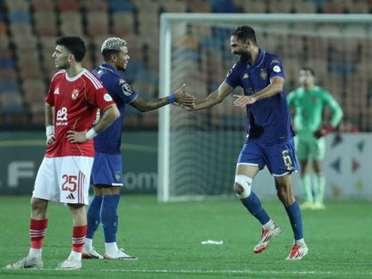 احتفال لاعبي الترجي الرياضي التونسي بتسجيل هدف في مرمى الأهلي المصري بدوري أبطال إفريقيا - 22 مارس 2026 - X/@CAFCLCC_ar