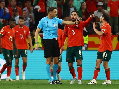 الحكم ساندرو شار خلال إدارته مباراة إسبانيا والبرتغال في نهائي دوري الأمم الأوروبية 2025 - 8 يونيو 2025 - Reuters