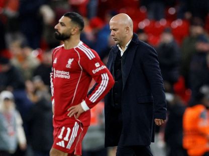 مدرب ليفربول آرني سلوت ولاعب ليفربول محمد صلاح بعد مباراة أيندهوفن في دوري أبطال أوروبا  - 26 نوفمبر 2025 - Reuters