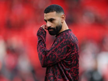 محمد صلاح لاعب ليفربول في الإحماء قبل مواجهة برايتون آند هوف ألبيون في الدوري الإنجليزي الممتاز - 13 ديسمبر 2025 - Reuters