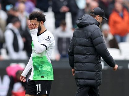 مدرب ليفربول يورغن كلوب ومحمد صلاح بعد مباراة وست هام يونايتد – 27 أبريل 2024 - Reuters