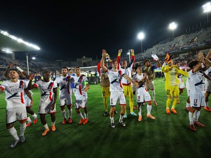 لاعبو باريس سان جيرمان يحتفلون بالفوز على برشلونة في دوري أبطال أوروبا - 1 أكتوبر 2025 - Reuters