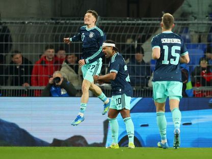 فلوريان فيرتز يحتفل بهدفه في مباراة ألمانيا وسويسرا الودية - 27 مارس 2026 - Reuters