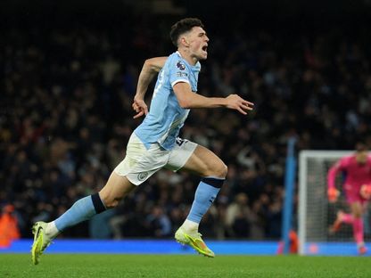 فيل فودين مدرب مانشستر سيتي يحتفل بهدف الفوز على ليدز يونايتد في الدوري الإنجليزي الممتاز - 29 نوفمبر 2025 - Reuters