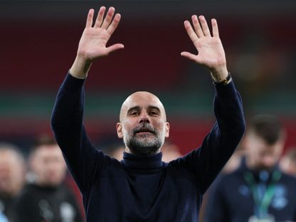 بيب غوارديولا مدرب مانشستر سيتي يحتفل بالتتويج بكأس رابطة الأندية الإنجليزية - 22 مارس 2026 - Action Images via Reuters