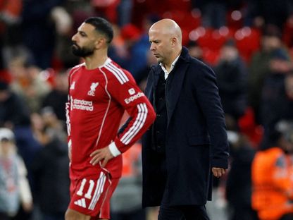 مدرب ليفربول آرني سلوت ولاعب ليفربول محمد صلاح بعد مباراة أيندهوفن في دوري أبطال أوروبا  - 26 نوفمبر 2025 - Reuters