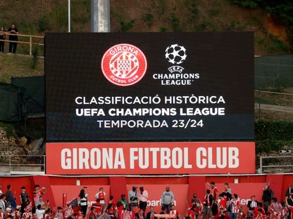 نادي جيرونا يحتفل بتأهله الأول إلى دوري أبطال أوروبا بعد الفوز على برشلونة 4-5-2024 - Reuters