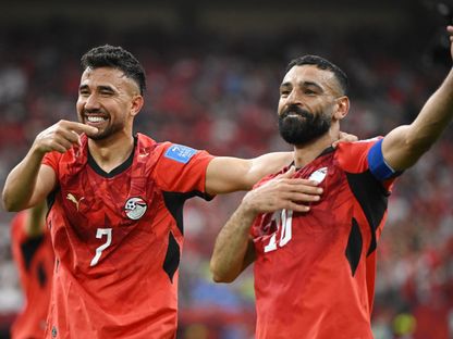 محمود تريزيغيه يحتفل بهدفه مع محمد صلاح خلال مباراة مصر ونيوزيلندا بكأس العالم - 22 يونيو 2026 - Reuters