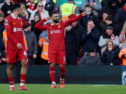 محمد صلاح مهاجم ليفربول يحتفل بهدفه في مرمى إيبسويتش تاون - 25 يناير 2025 - Reuters