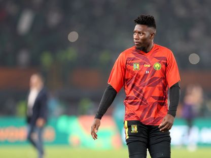 أندريه أونانا حارس مرمى الكاميرون خلال عملية الإحماء قبل مباراة دور الـ16 من كأس أمم إفريقيا ضد نيجيريا - 27 يناير 2024 - Getty Images
