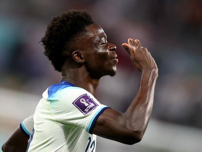 بوكايو ساكا يحتفل بعد تسجيله هدفاً لإنجلترا في شباك إيران - 21 نوفمبر 2022 - reuters