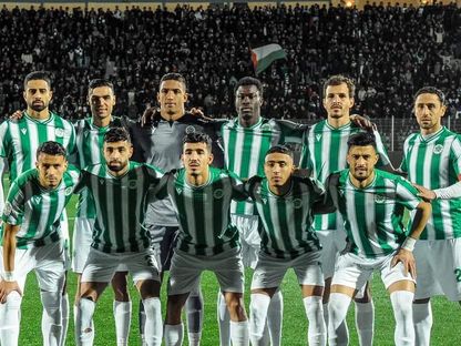 صورة جماعية لتشكيلة مولودية وجدة قبل مباراة حسنية أكادير بالدوري المغربي  - Facebook/صحيفة المولودية الوجدية