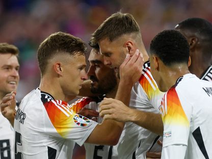 لاعبو ألمانيا يحتفلون بعد تسجيل نيكلاس فولكروغ الهدف الرابع لألمانيا في شباك اسكتلندا في مباراة افتتاح يورو 2024 - 14 يونيو 2024 - reuters