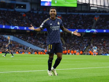 رودريغو يحتفل بتسجيله هدفاً لريال مدريد في مرمى مانشستر سيتي بدوري أبطال أوروبا - 17 أبريل 2024 - Reuters