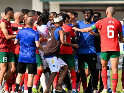 جانب من اشتباكات لاعبي المغرب والكونغو الديمقراطية في كأس أمم إفريقيا - 21 يناير 2024 - AFP