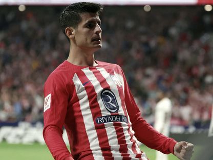 مهاجم أتلتيكو مدريد ألفارو موراتا يحتفل بتسجيل ثنائية في مرمى ريال مدريد 24-9-2023 - Reuters