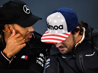 ألونسو وهاميلتون - AFP