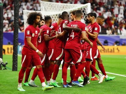 احتفال لاعبي منتخب قطر بهدف في شباك فلسطين - 29 يناير 2024 - Reuters