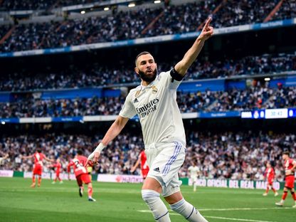 كريم بنزيما يحتفل بهدف سجله خلال مباراة بين ريال مدريد ورايو فايكانو في الدوري الإسباني - 24 مايو 2023 - NurPhoto via AFP