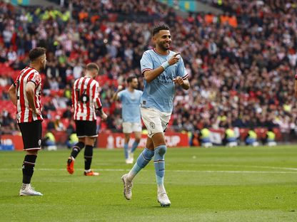 رياض محرز يحتفل بهدفه الثالث لمانشستر سيتي في مرمى شيفيلد يونايتد بنصف نهائي كأس الاتحاد الإنجليزي - 22 أبريل 2023 - Reuters
