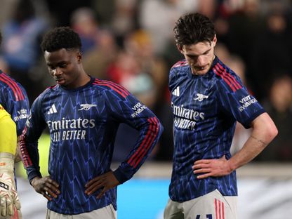 ديكلان رايس وزميله في أرسنال بوكايو ساكا خلال مواجهة برينتفورد في الدوري الإنجليزي الممتاز - 12 فبراير 2026 - Reuters