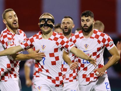 فرحة لاعبي كرواتيا بالفوز على بولندا - 22 سبتمبر 2022 - REUTERS