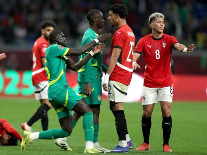 إمام عاشور (يمين) وعمر مرموش ثنائي مصر خلال مواجهة السنغال - 14 يناير 2026 - Reuters