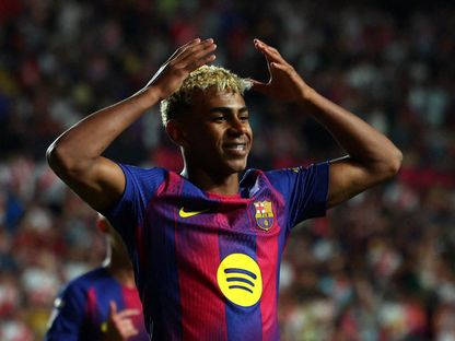 لاعب برشلونة لامين يامال يحتفل بالتسجيل في مرمى رايو فايكانو في الدوري الإسباني -  31 أغسطس 2025 - ٌReuters