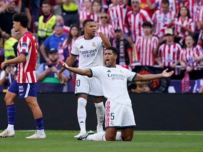 لاعبا ريال مدريد جود بيلينغهام وكيليان مبابي خلال مباراة أتلتيكو مدريد في الدوري الإسباني - 20 سبتمبر 2026 - Reuters
