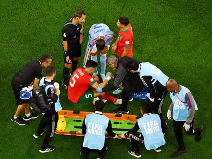 نايف أكرد مدافع المغرب يُغادر مصابا أمام إسبانيا في مونديال قطر- 06 ديسمبر 2022 - Reuters