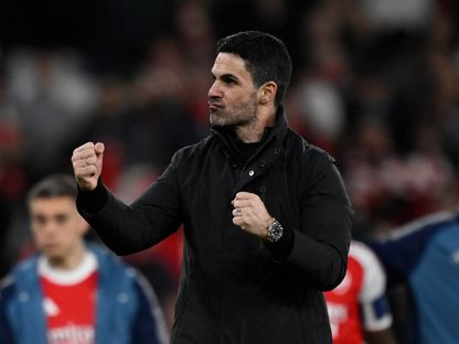 مدرب أرسنال ميكيل أرتيتا يحتفل بعد مباراة باير ليفركوزن في إياب دور 16 لدوري أبطال أوروبا - 17 مارس 2026 - Reuters
