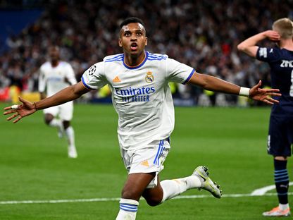 رودريجو لاعب ريال مدريد يحتفل بعد إحرازه هدف في شباك مانشستر سيتي- 4 مايو 2022 - AFP