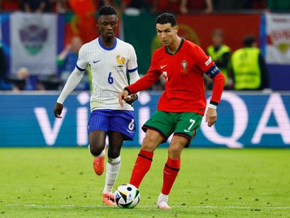 كريستيانو رونالدو وإدواردو كامافينغا في لقاء البرتغال وفرنسا بربع نهائي يورو 2024 - 5 يوليو 2024 - Reuters
