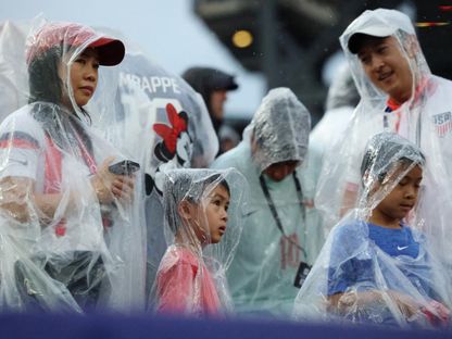 أمطار غزيرة خلال لقاء فرنسا والعراق بكأس العالم - 22 يونيو 2026 - Reuters