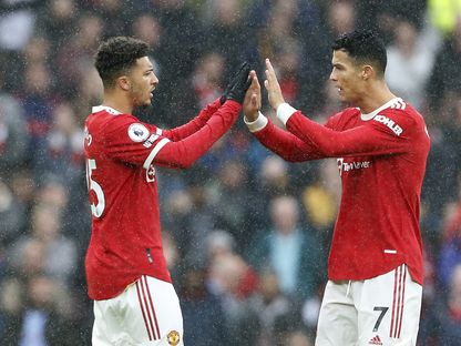 كريستيانو رونالدو رفقة زميله في مانشستر يونايتد جادون سانشو - REUTERS