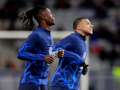 لاعبا منتخب فرنسا كيليان مبابي وإدواردو كامافينغا - 17 أكتوبر 2023 - Reuters