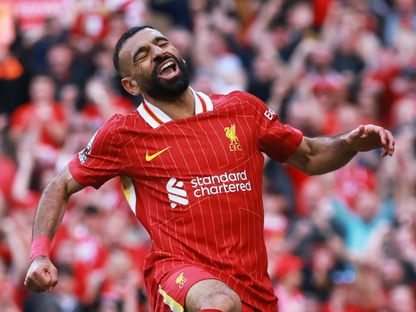 محمد صلاح يحتفل بهدف ليفربول الرابع ضد توتنهام - 27 أبريل 2025 - Reuters