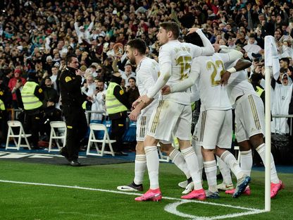 فرحة لاعبي ريال مدريد بأول أهداف الكلاسيكو الماضي - AFP